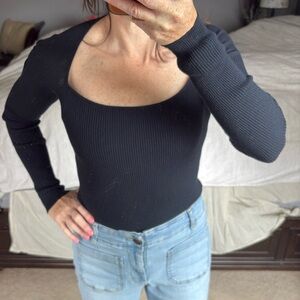 The limited navy blue,ribbed, boatneck long sleeve